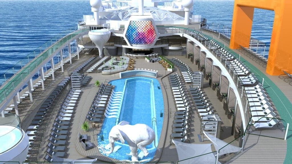 Das Resort Deck, eine Vision der Designerin Kelly Hoppen, ist ein atemberaubender, asymmetrischer Raum mit einem 25-Meter-Pool, der mit Liegen im  ausgestattet und von einem terrassenförmigen Pooldeck umgeben ist. Foto: © Celebrity Cruises